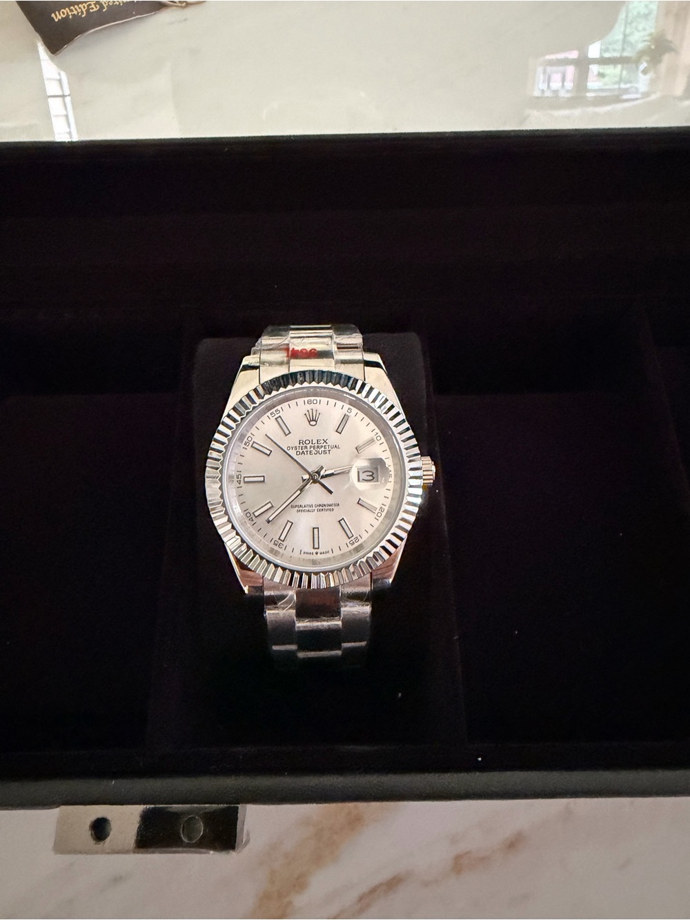 Rolex silver and white Datejust-style watch
